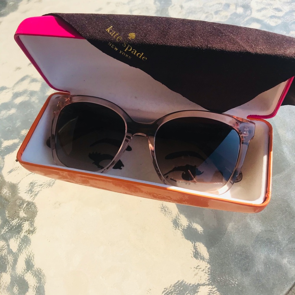 Kate Spade Sunglasses. Pink/white trim on sides.